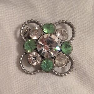 Elegant Silver and Green Brooch